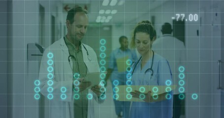 Poster - Male doctor and female nurse reviewing medical records in hospital, showing glowing data grid