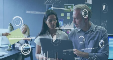 Poster - Business team collaborating around desk passing yellow folder and viewing laptop holographic charts