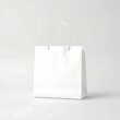 © Sanju - white paper bag on light background
