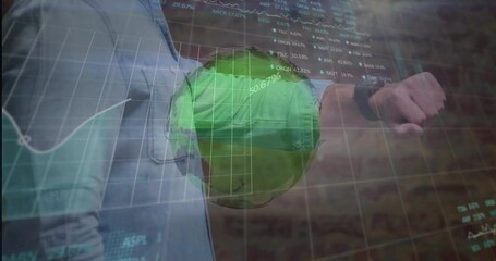 Poster - Man checking smartwatch in finance workspace, showing holographic globe and floating stock tickers