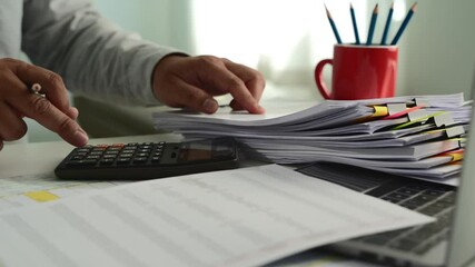 Poster - Businessman calculating balance prepare tax  uses a laptop and calculator to inspect financial reports, plan budgets, manage income, and track expenses			

