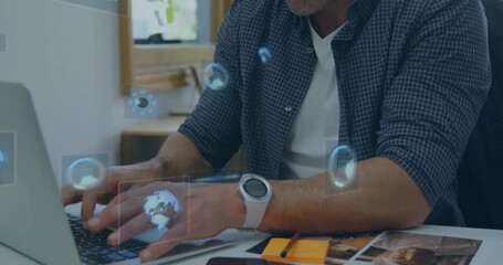 Poster - man typing on laptop in home office, displaying holographic globe and loading icons for technology