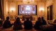 © Fitriaa - People Watching Movie on Projector
