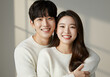 © JARVIS X - Happy Asian Couple Smiling, Hugging, Portrait Studio, White Sweaters, Friendship, Relationships.