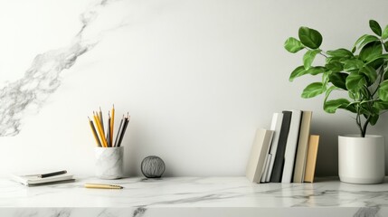 Poster - Replica marble table with books, craft tools, pencils and houseplant.