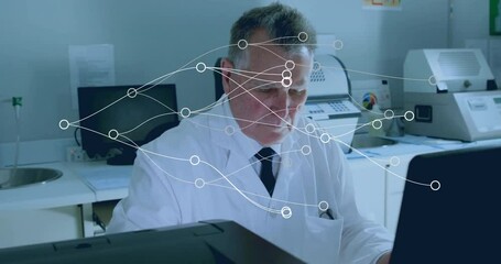 Poster - Senior male doctor working at laptop in medical lab, showing data flow overlay graphics