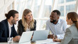 © Alina - business team working together in office