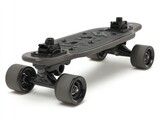 Black skateboard isolated on white background. Skateboard with black wheels hardware. Extreme sport activity skateboarding urban culture modern lifestyle. Skateboard on shadow