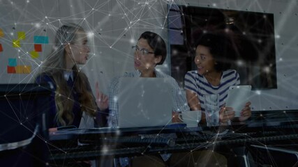Poster - Colleagues discussing business strategy with laptop, tablet and animated technology network overlay