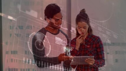 Poster - Male and female colleagues examining tablet in modern office, displaying business charts and maps