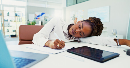 Poster - Bored, black woman and writing with fatigue for burnout, stress or insomnia at office desk. Tired, female person or lazy employee taking notes by technology for procrastination or sluggish work ethic