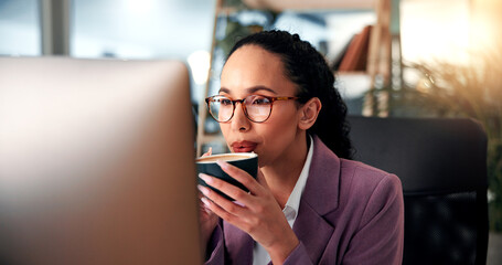 Fototapete - Woman, business and drinking coffee at computer with glasses, morning routine and reading in office. Professional, reflection or mug in workplace for article review, email or journalist at technology
