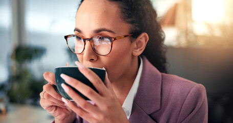 Poster - Woman, business and drinking coffee in office with glasses, morning routine and reading on computer. Professional, reflection or mug in workplace for article review, email or journalist at technology