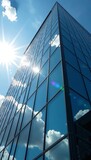 Sunlit clouds reflecting in modern glass skyscraper windows, reflection, sky, windows