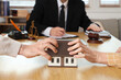 © Pixel-Shot - Mature couple dividing house at divorce lawyer's office, closeup