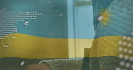 Poster - Man viewing screen in tech office, interacting with animated world map overlay and code