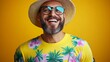 © Trushchenko_O - Man wearing a yellow shirt with palm trees on it is smiling and wearing sunglasses. He is wearing a straw hat and has a beard