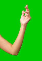 Poster - Hand gesture against a vibrant green background with soft contours and a relaxed pose