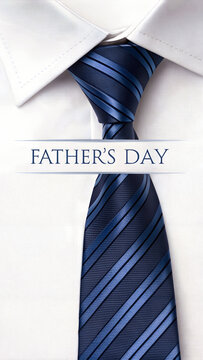 A Father's Day greeting card featuring a realistic blue striped necktie with a neatly tied knot showcased against a clean white background for an elegant design