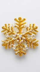 Poster - Golden snowflake ornament adorned with snow crystals on a white background creating a festive winter mood with a clean and elegant holiday season aesthetic