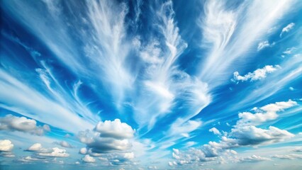 A breathtaking view of wispy, feathery clouds streaking across a vibrant blue sky, creating a dramatic and awe-inspiring celestial canvas.