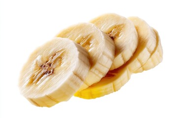 Poster - Sliced banana pieces arranged on a white surface showcasing the fruit's texture and freshness in a clean shot