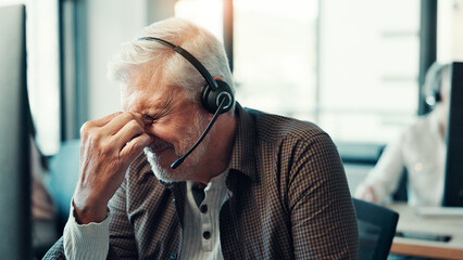 Poster - Senior man, headache and stress at call center with pressure, frustrated and exhausted with burnout at agency. Person, consultant and migraine with fatigue, pain and voip mic for contact us in office