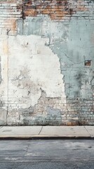 Poster - Urban decay brick wall with peeling paint and sidewalk creating an aged textured background perfect for artistic projects and design