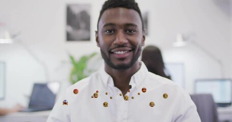 Poster - office worker smiling at camera while interacting in business office with floating emoji icons
