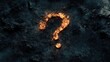 © sadad - Fiery question mark on dark rock; mystery concept