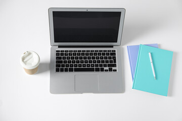 Aufkleber - Office supplies, laptop and takeaway paper cup on white table, above view