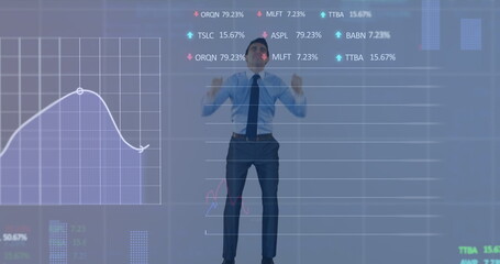 Poster - Stock market data processing against caucasian businessman celebrating against grey background
