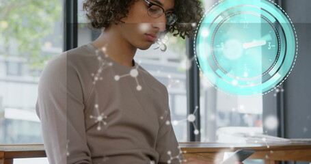 Poster - Image of clock moving and shapes over biracial businessman using smartphone