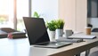 © fitpinkcat84 - Photo of open laptop with visible screen on table in office meeting room, modern workspace, minimal composition