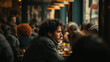 © ABF_MATEO - Man in thought, seated in a busy restaurant, looking off in the distance. The room is full of blurred patrons and warm light.