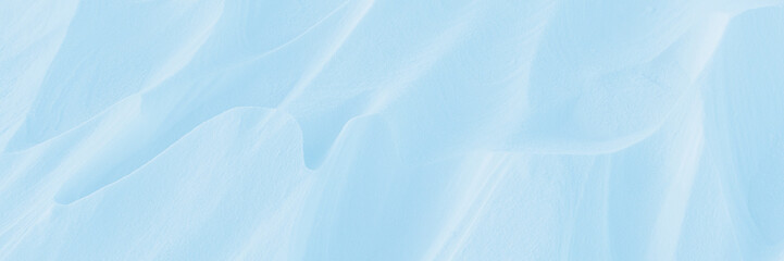 Wall Mural - snow texture. wind sculpted patterns on snow surface. wind in the tundra and in the mountains on the