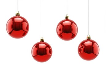 Wall Mural - Four shiny red christmas ornaments hanging from strings against a plain white background isolated shot