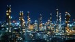 © gentho - Oil refinery at night, illuminated by lights
