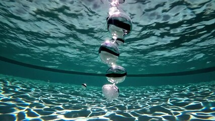 Poster - Exploring the mesmerizing dance of bubbles beneath turquoise waters in a serene aquatic landscape Generative AI