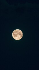 Wall Mural - Video Night Nighttime Timelapse. Moon In Dark Night Sky Natural Background Time Lapse. White And Yellow Moon. Full Moon Timelapse. Clear Starless Night. Movement Of The Moon Across The Sky. Satellite