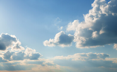 Wall Mural - beautiful blue sky with soft white clouds for abstract background