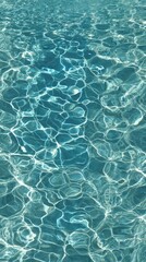 Poster - Serene turquoise water surface shimmering with sunlight creating abstract patterns and a feeling of tranquility perfect for summer vacation and relaxation background texture