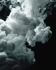 Poster - Ethereal cloud of white paint swirling gracefully in dark water creating a dreamy abstract composition with soft delicate texture and a sense of depth