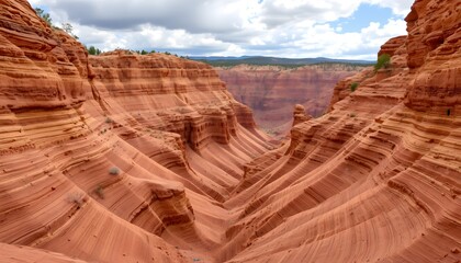 Poster - Stunning erosion in a wind-swept sandstone canyon with dramatic sky in the background