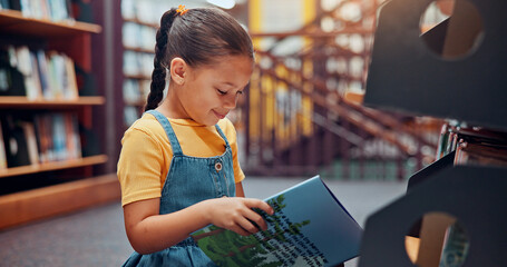 Poster - Girl, kid and reading book in library, learning and smile with fantasy, education and vocabulary. School, student and child development with information, storytelling and growth with novel and relax