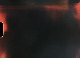 Light leaks and film grain creating abstract background texture