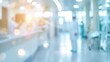 © Eireen - Medical concept background with blurred silhouette of doctor walking in bright hospital corridor with bokeh light effect