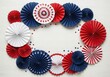 © Ozz - Patriotic paper fans in red, white, and blue arranged in a circular pattern on white wood background.
