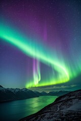 Wall Mural - a view of the aurora bore over a lake and mountains