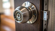 © BoOm - Close up view of metallic door lock and knob, showcasing intricate design and mechanism, emphasizing security